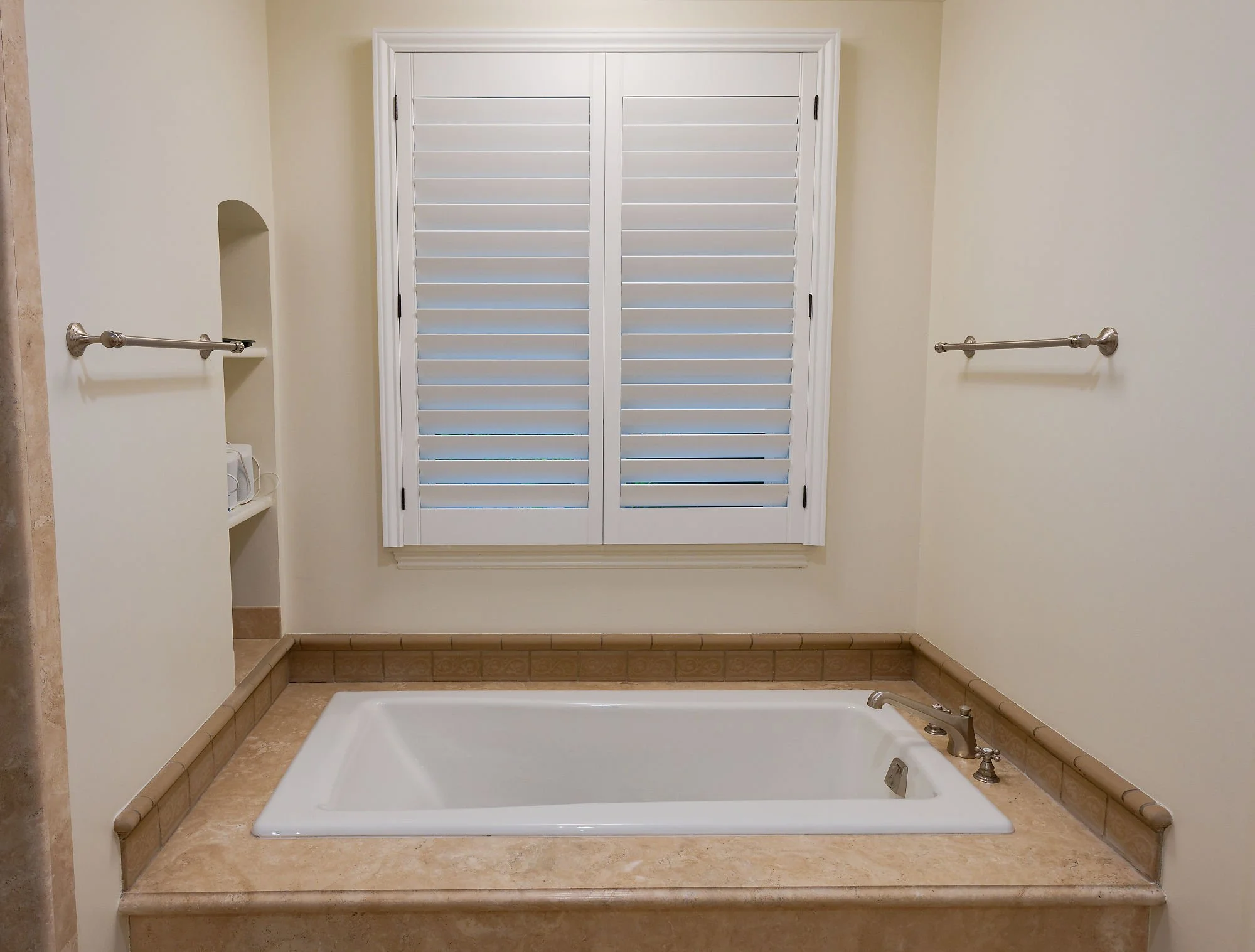 Completed project — 13: Bathroom with a bathtub and custom window shutters